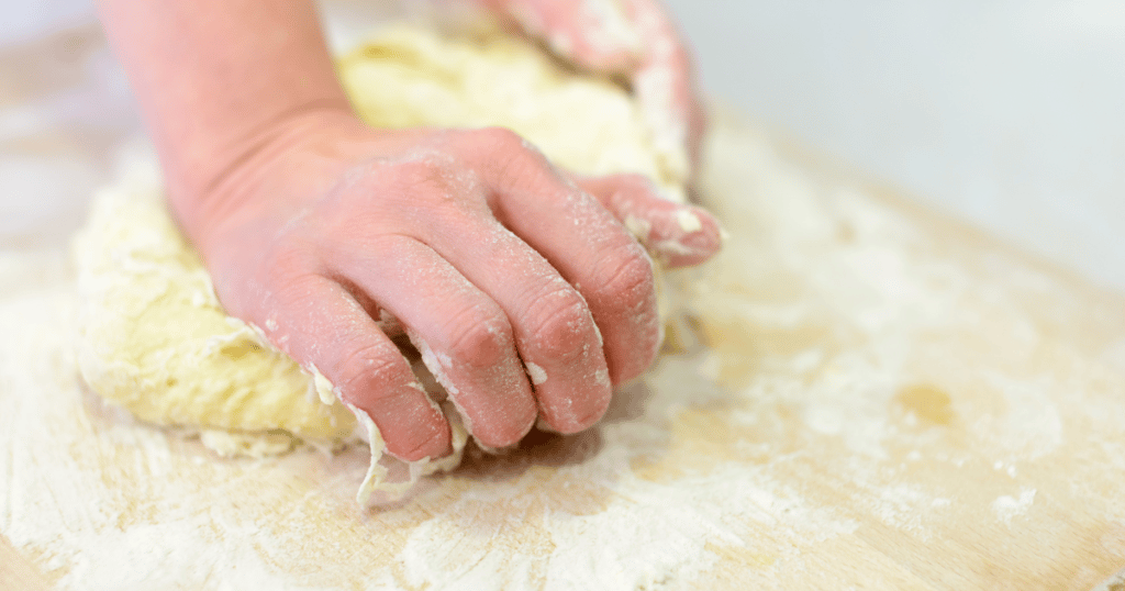 kneading dough pushing away