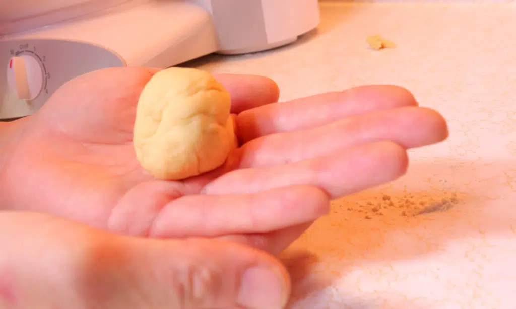 golfball size of bread dough in hand