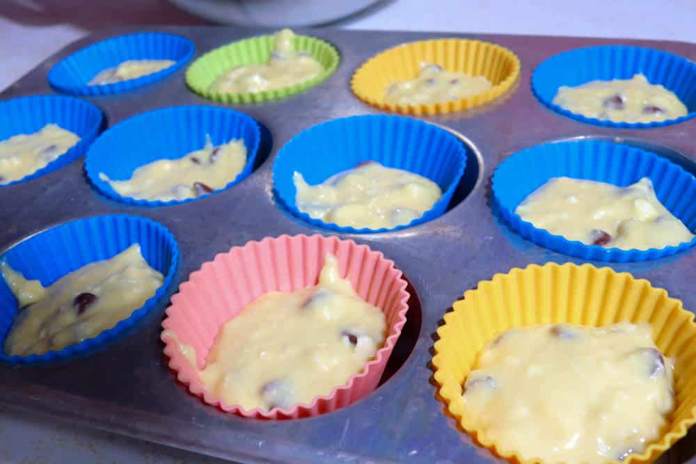 fill muffin liners with sourdough chocolate chip muffin batter